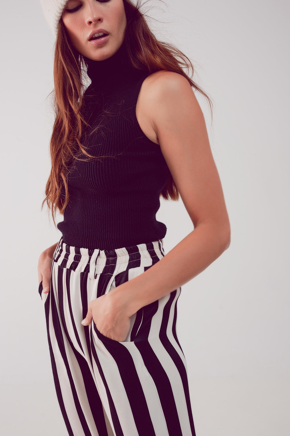 Knitted high neck top in black - Jumpers