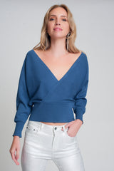 Knitted sweater with wrapped V-neck in blue