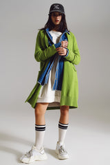 Cardigan longo verde com bolsos dobrados