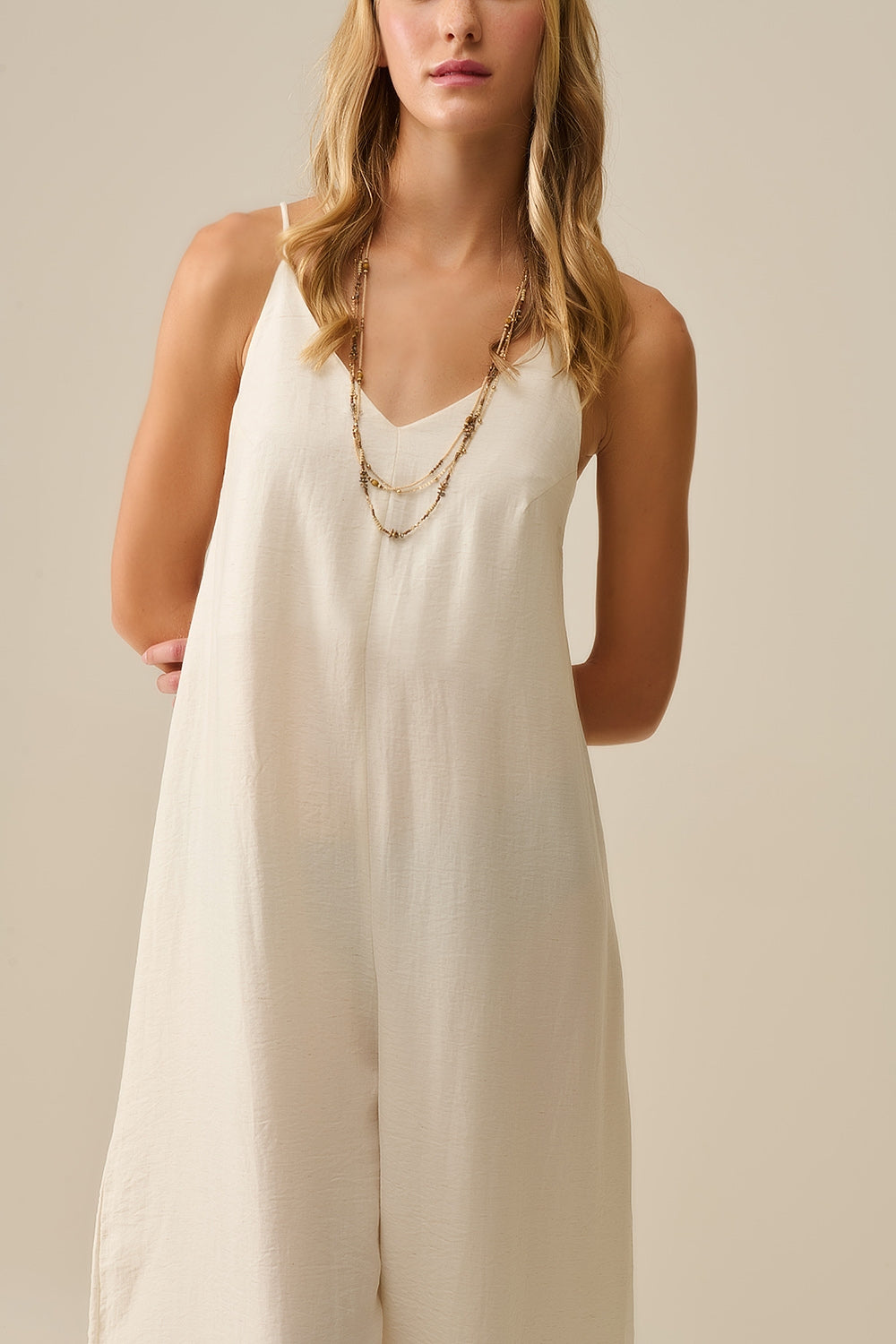 Long Textured Jumpsuit with Beaded Straps in Cream - Jumpsuits