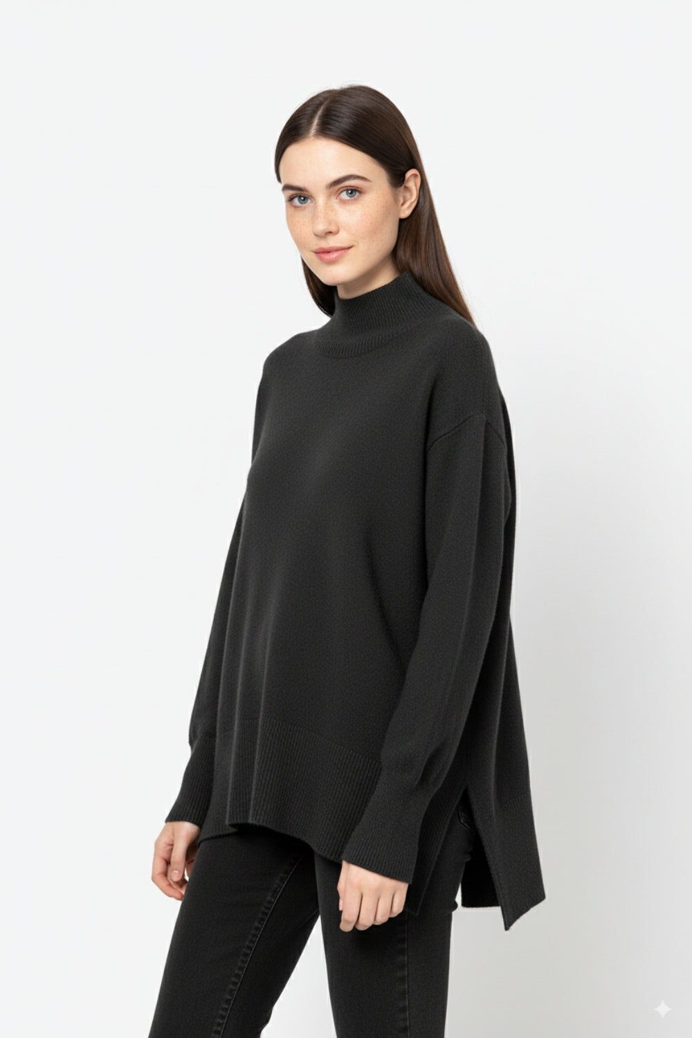 Loose black sweater with open back detail -