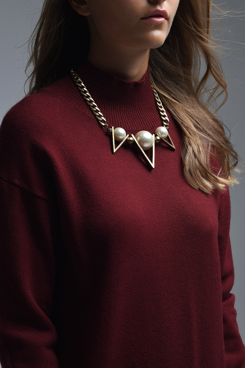 Loose burgundy sweater with open back detail -