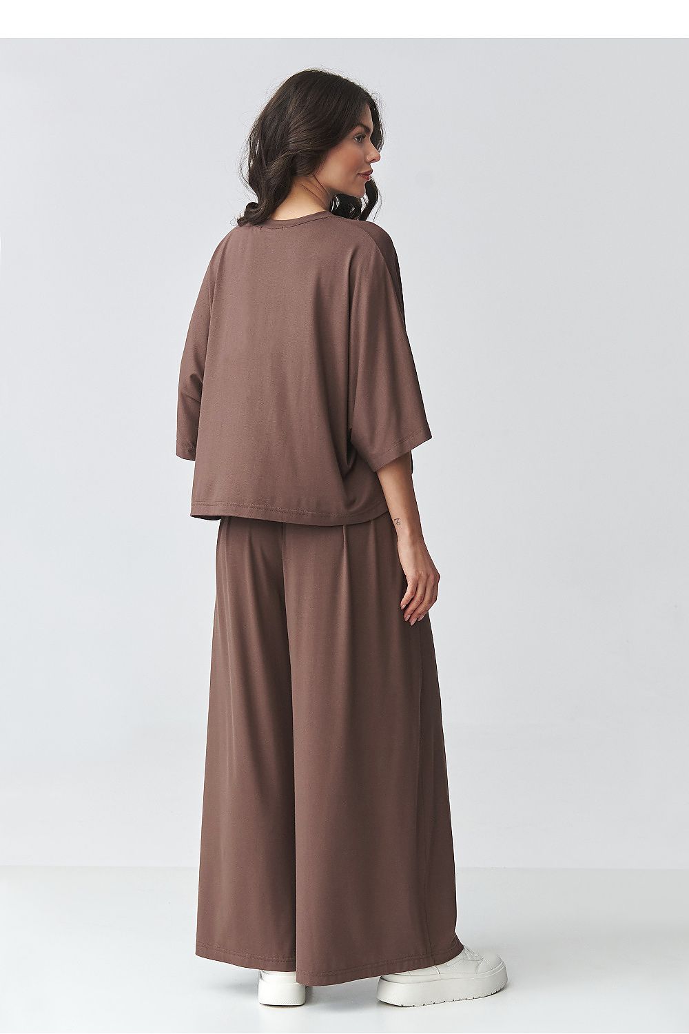 Makadamia loose-fitting blouse paired with matching wide-leg trousers in a stylish brown outfit set