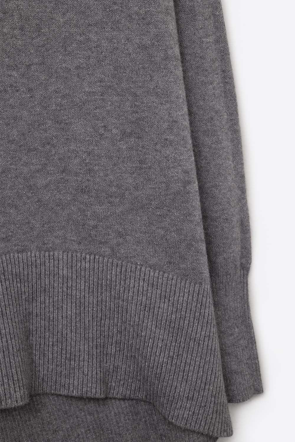 Loose gray sweater with open back detail -
