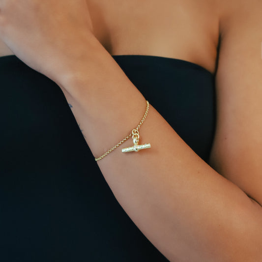 Luna Charles gold plated bracelet featuring a unique toggle design for elegant style