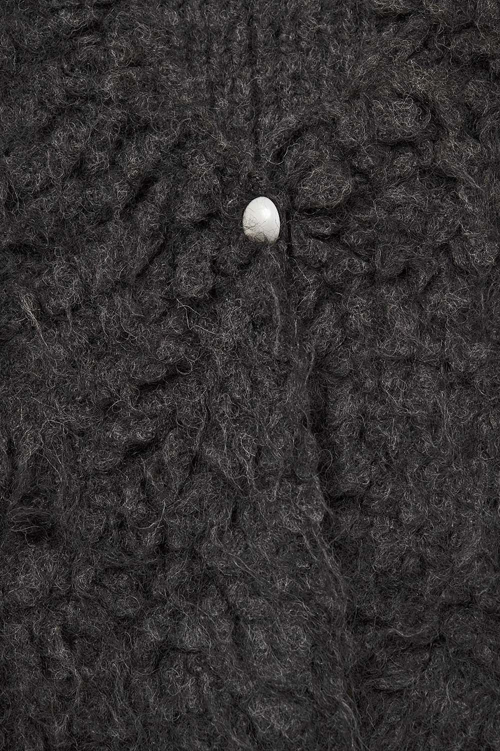 Luxurious vest with black long-haired texture -