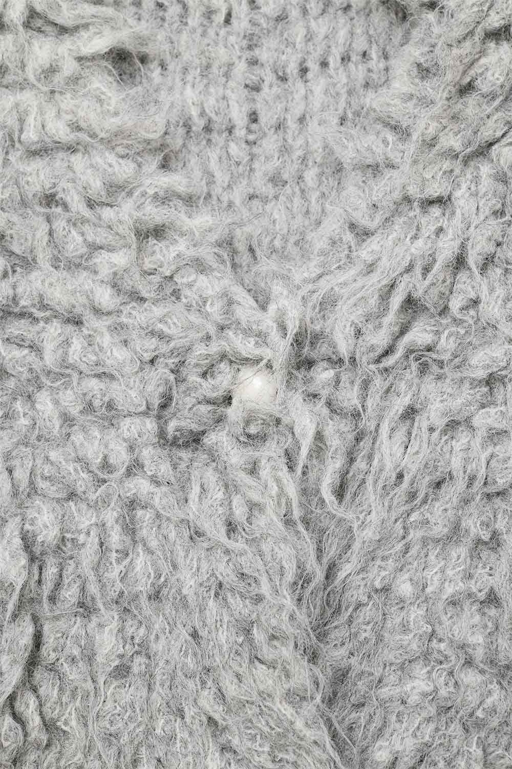 Luxurious vest with grey long-haired texture -