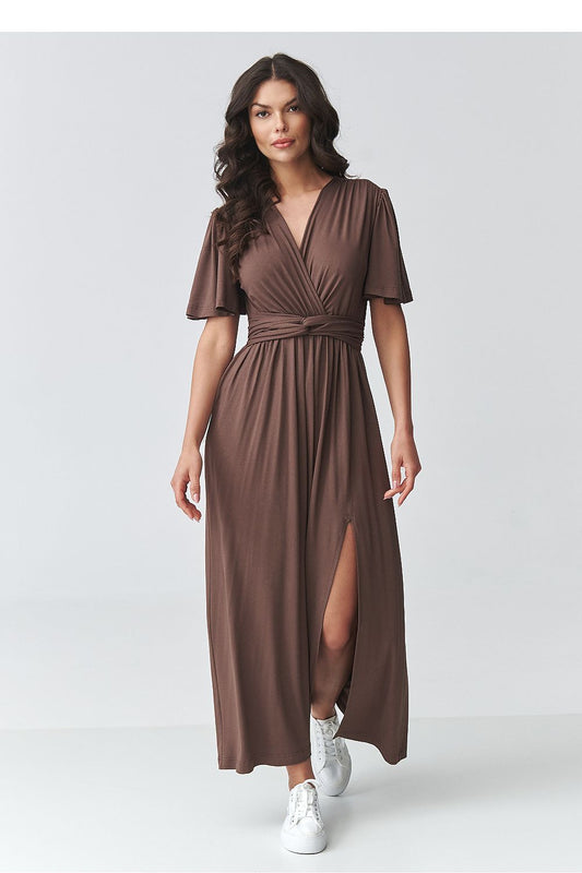 Makadamia brown maxi dress with a wrap design and side slit, perfect for casual outings