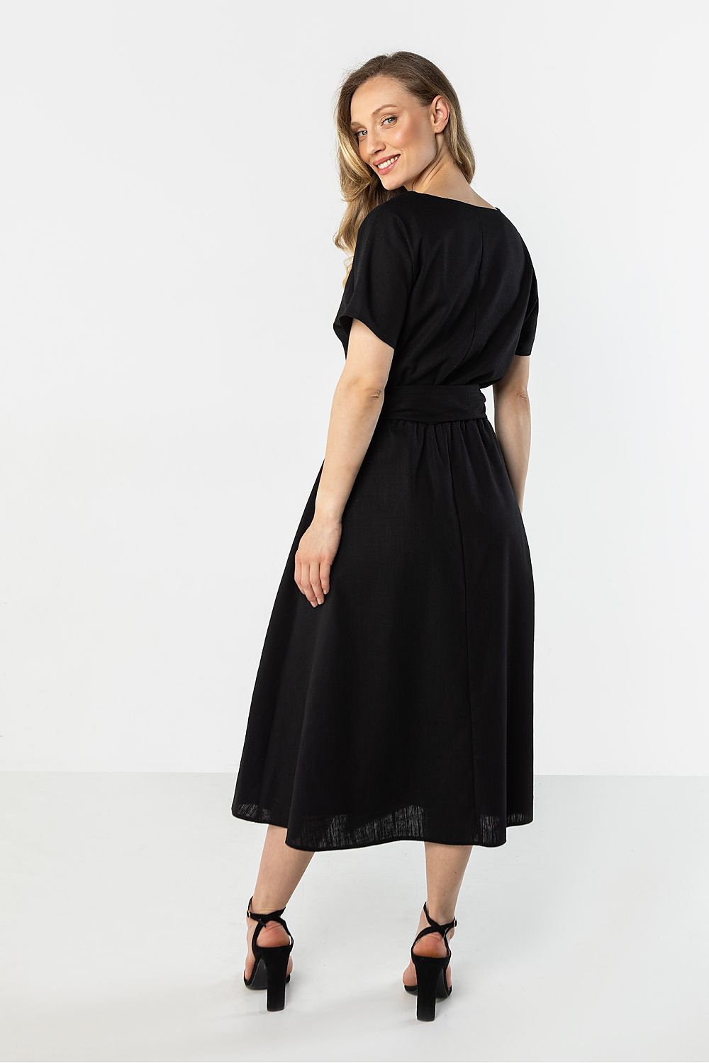 Black midi flared bottom dress by Awama with a stylish back design and comfortable fit