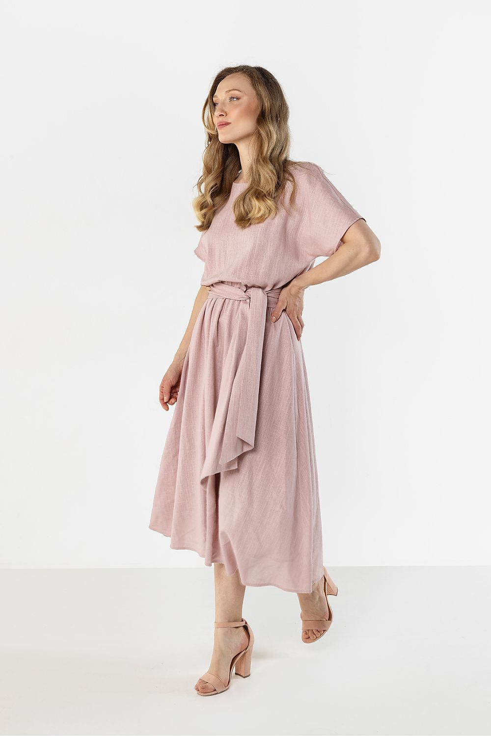 Awama midi flared bottom dress in soft pink with a waist belt and flowing design