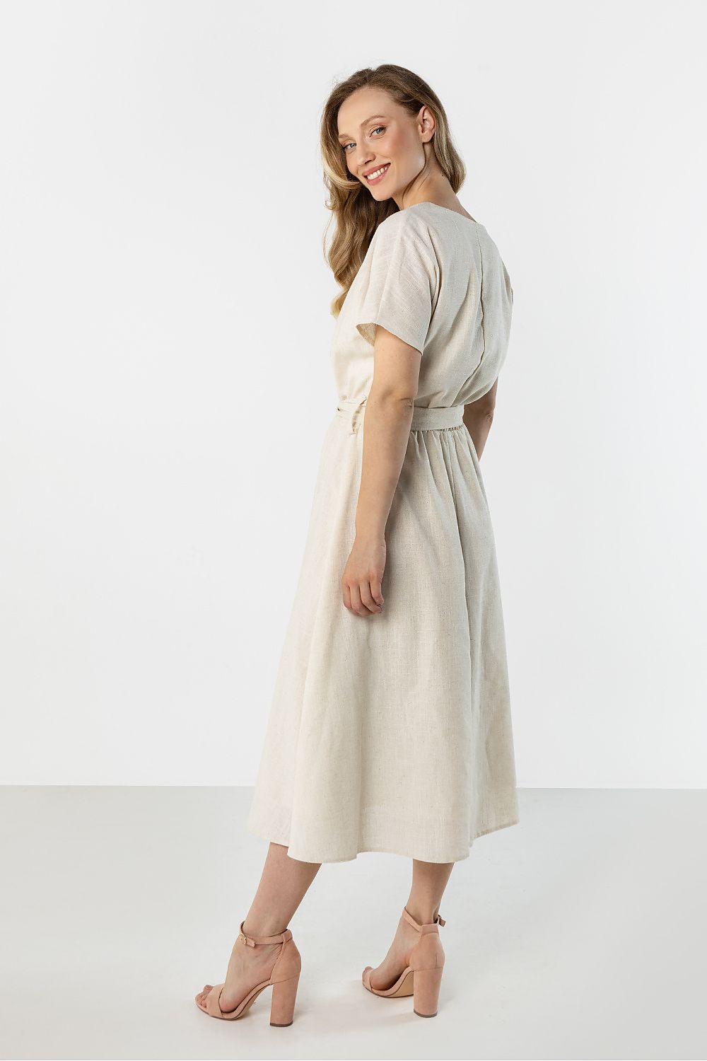 Awama midi flared bottom dress in cream with short sleeves and a cinched waist, perfect for casual outings