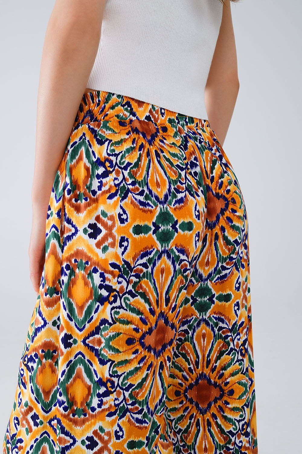 Multicolor Pants With Flower Print In Orange And Blue - Trousers