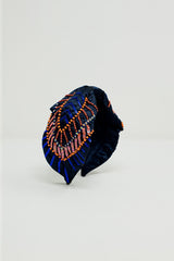 Bandeau bleu marine avec ornements en paillettes et strass