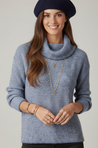 Navy blue ribbed knit sweater with a roll neck