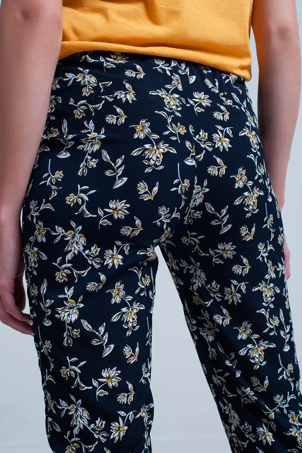 Navy floral pants with a belt - Trousers