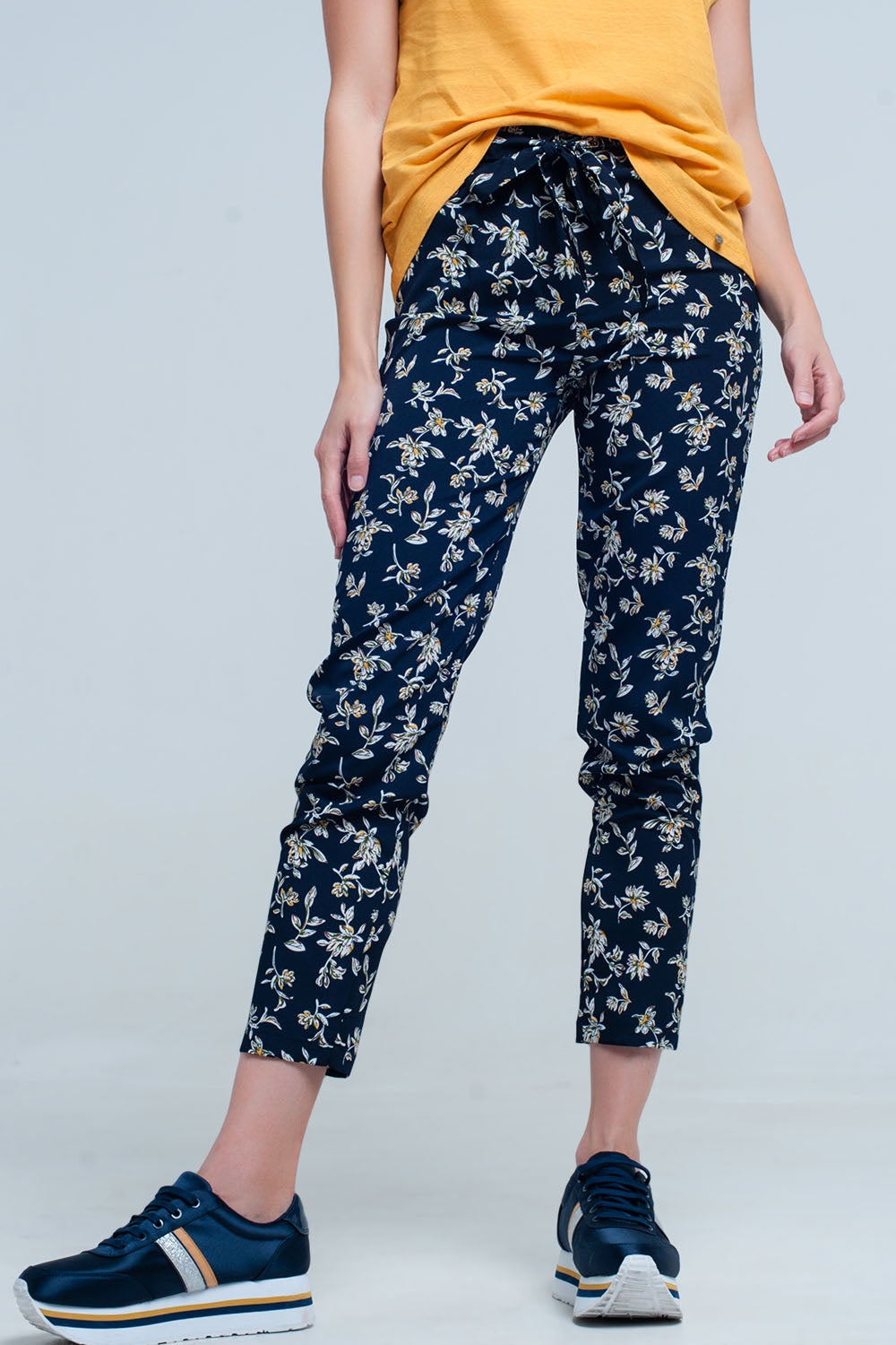 Navy floral pants with a belt - Trousers