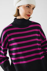 Navy oversized trutleneck sweater with fuchsia stripes and splits on the side