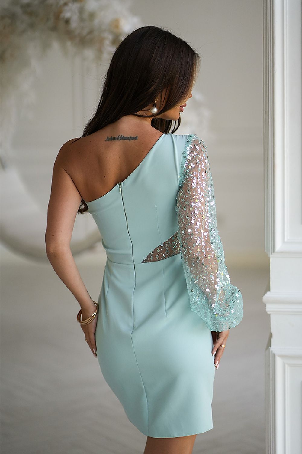 Bicotone one-shoulder sleeve short dress in mint green with sequin detailing on one arm