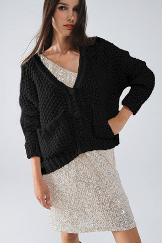 Oversized black chunky knit jacket with pockets