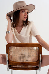 Peplum broderie top in Beige