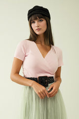 Pink sweater with crossed front and V-neck