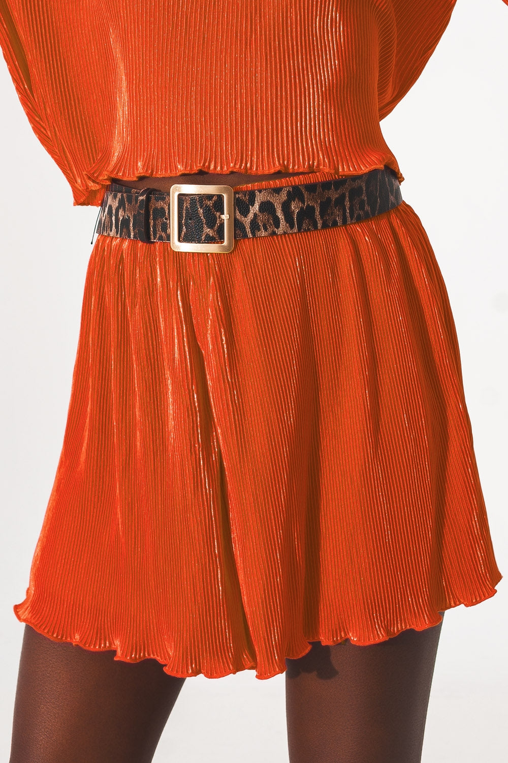 Pleated shorts in orange - Trousers