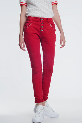 red boyfriend jeans with button closure