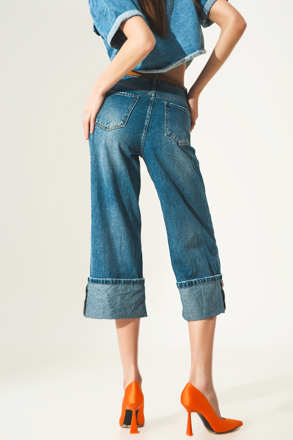 Relaxed jeans with rolled hem and exposed buttons in blue - Jeans