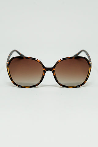 Round beige printed sunglasses with gold metal detail