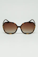 Round beige printed sunglasses with gold metal detail