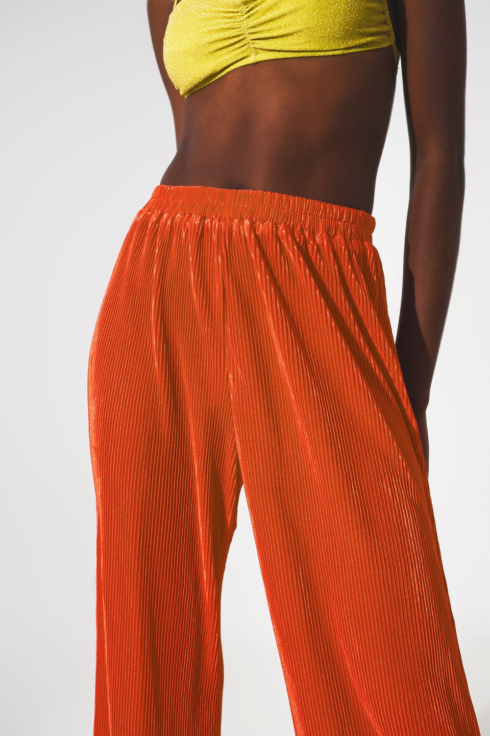 Satin pleated wide leg pants in orange - Trousers