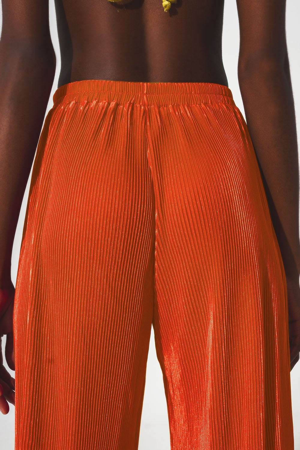 Satin pleated wide leg pants in orange - Trousers
