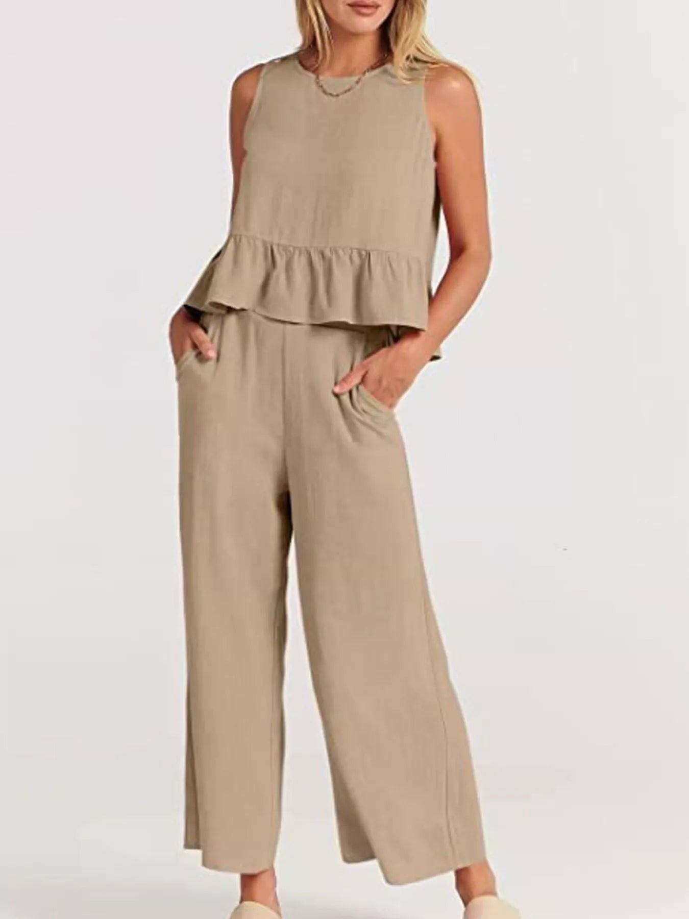 Trendsi set plus size featuring a peplum top and wide-leg trousers in a trendy taupe colour