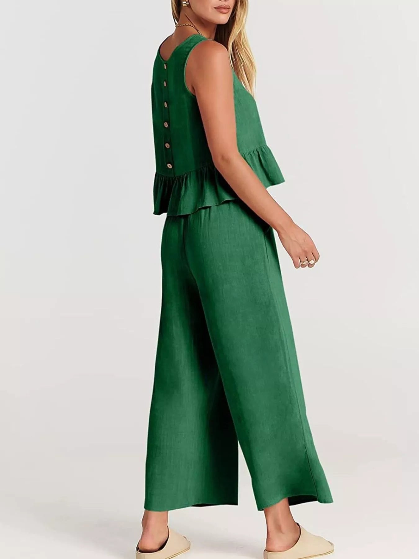 Trendsi plus size set featuring a green ruffled top and wide-leg trousers for comfortable style