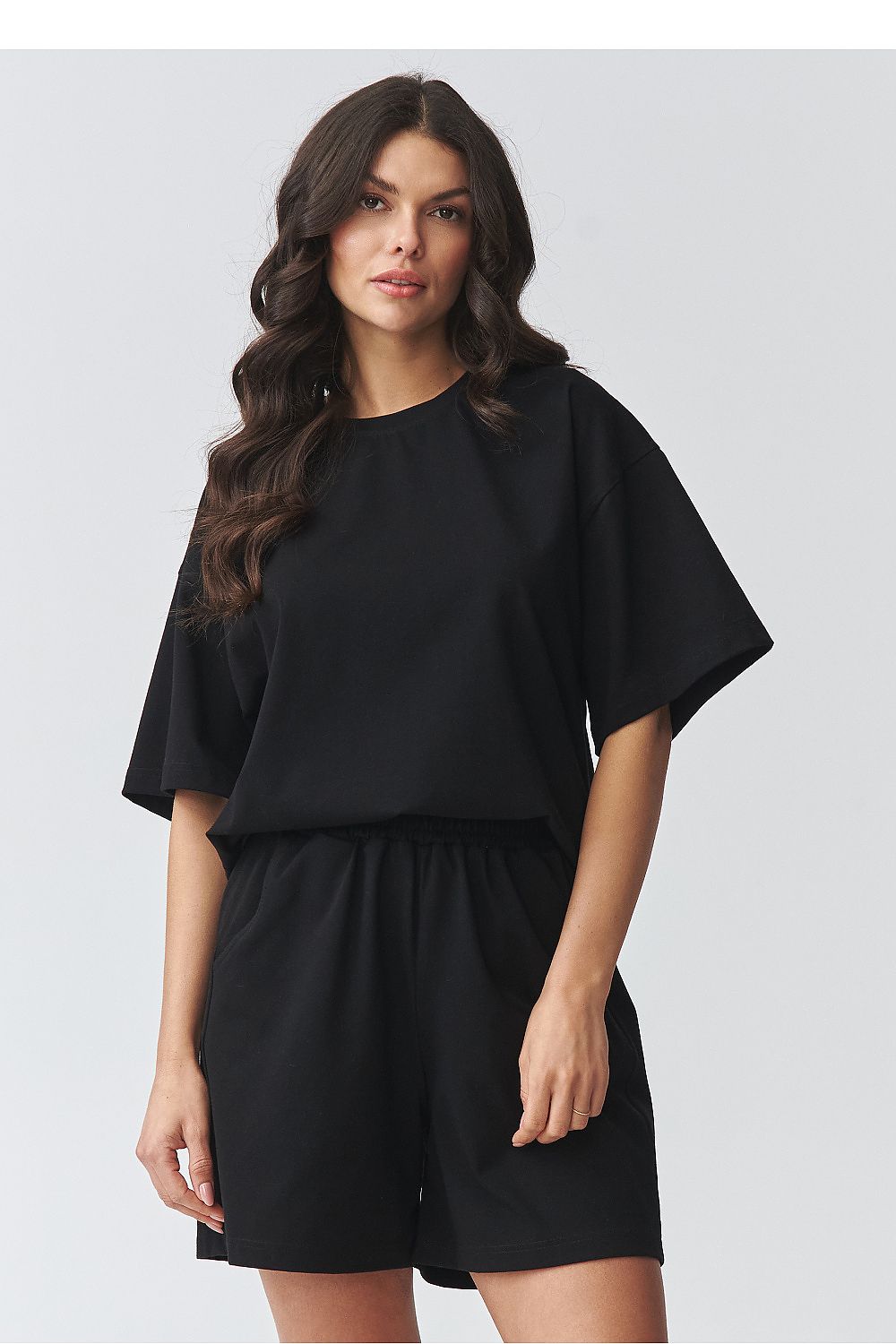 Makadamia set short sleeve blouse in black with matching shorts for a stylish casual look