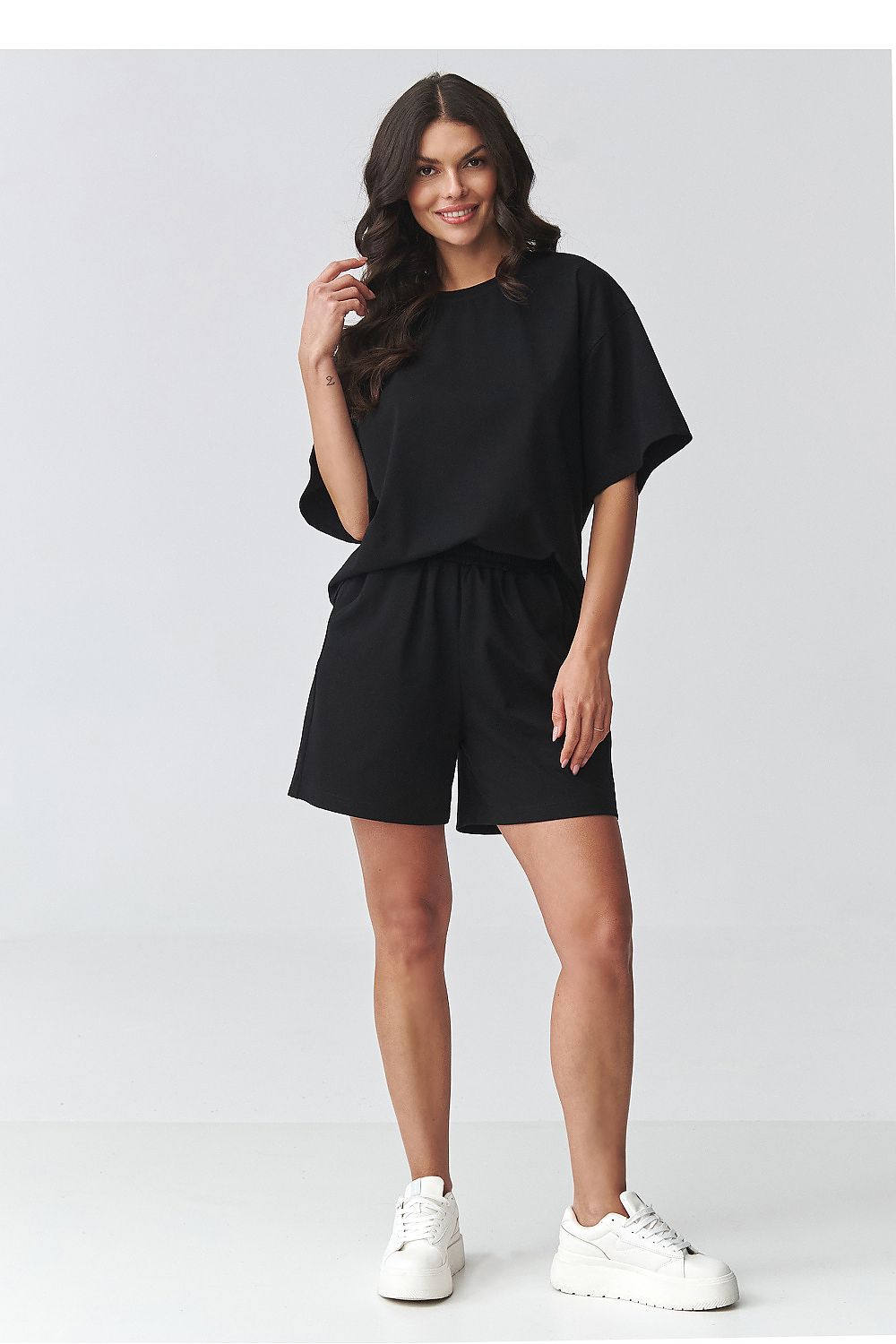 Makadamia black outfit set short sleeve blouse and matching shorts for a stylish look