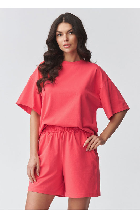 Makadamia set short sleeve blouse with matching coral shorts for a stylish summer look