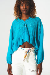 Crop top froncé avec broderie en bleu