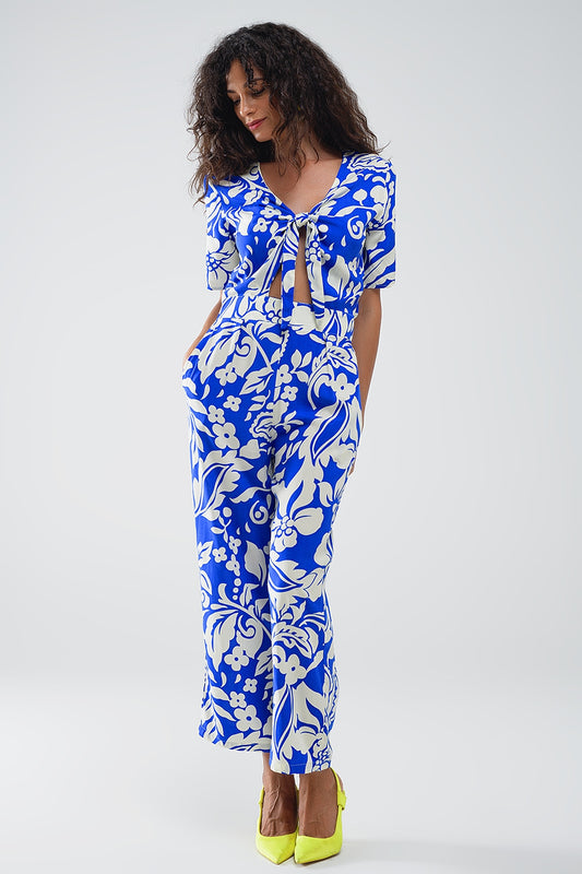 Short Sleeve Key Hole Front Floral Jumpsuit In Blue - Dresses
