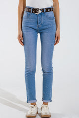 Jean skinny bleu délavé avec strass sur tout le devant