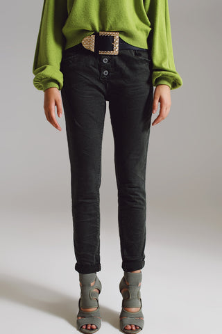 Skinny jeans with visible buttons in military green