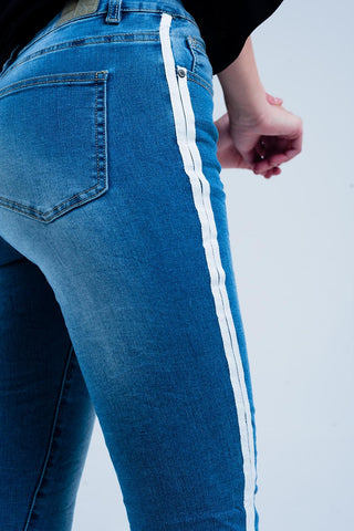 Skinny jeans with white side stripe