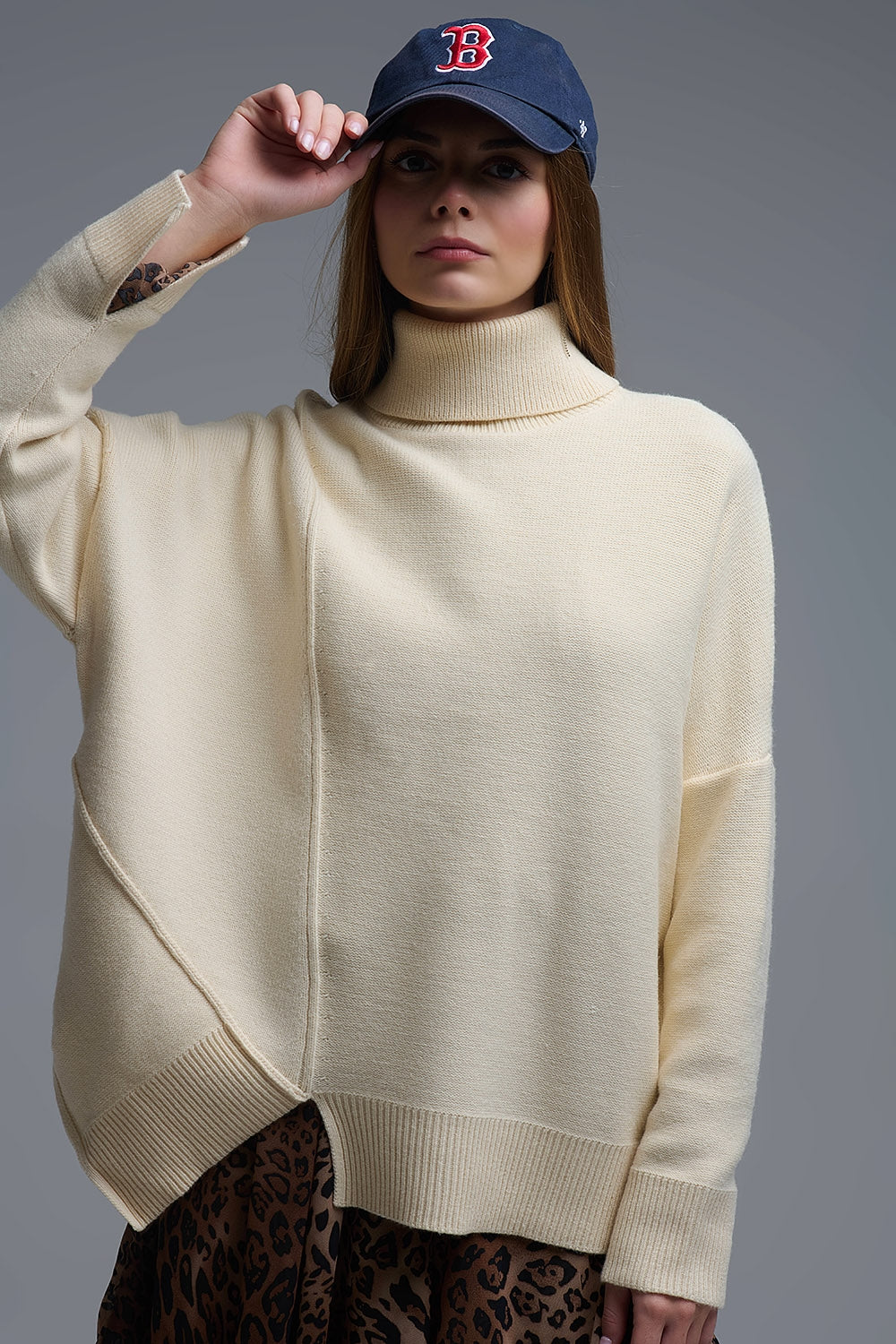 Soft knitted Asymmetric Turtleneck Sweater in beige - Sweaters