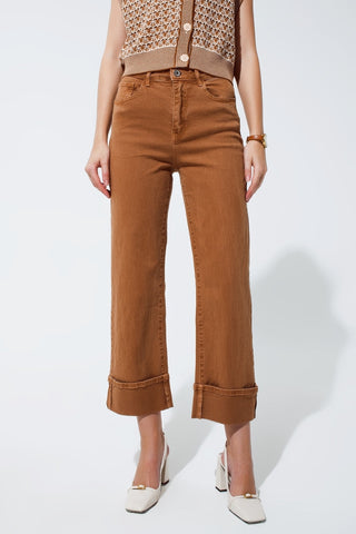 Straight leg jeans in camel with folded trouser legs