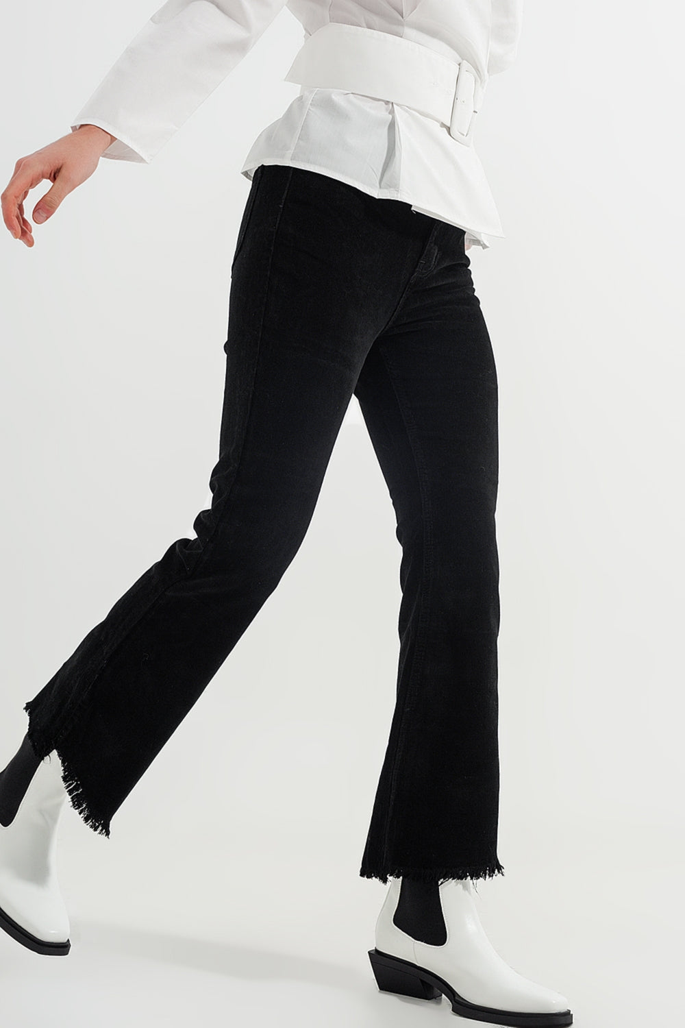 Stretchy cord flared trouser in black - Trousers