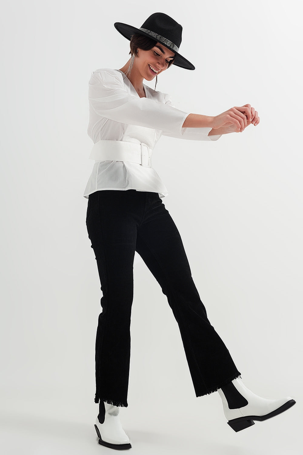 Stretchy cord flared trouser in black - Trousers
