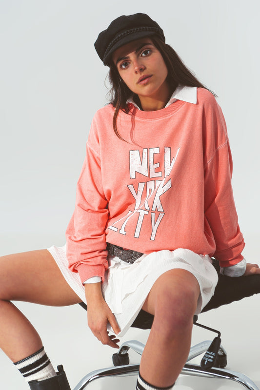 Sweatshirt with New York City text in Coral - Sweaters