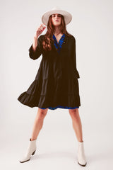 Robe mini à volants en noir
