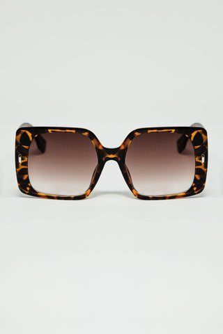 tiger print square sunglasses with gold detail on the side