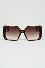 tiger print square sunglasses with gold detail on the side